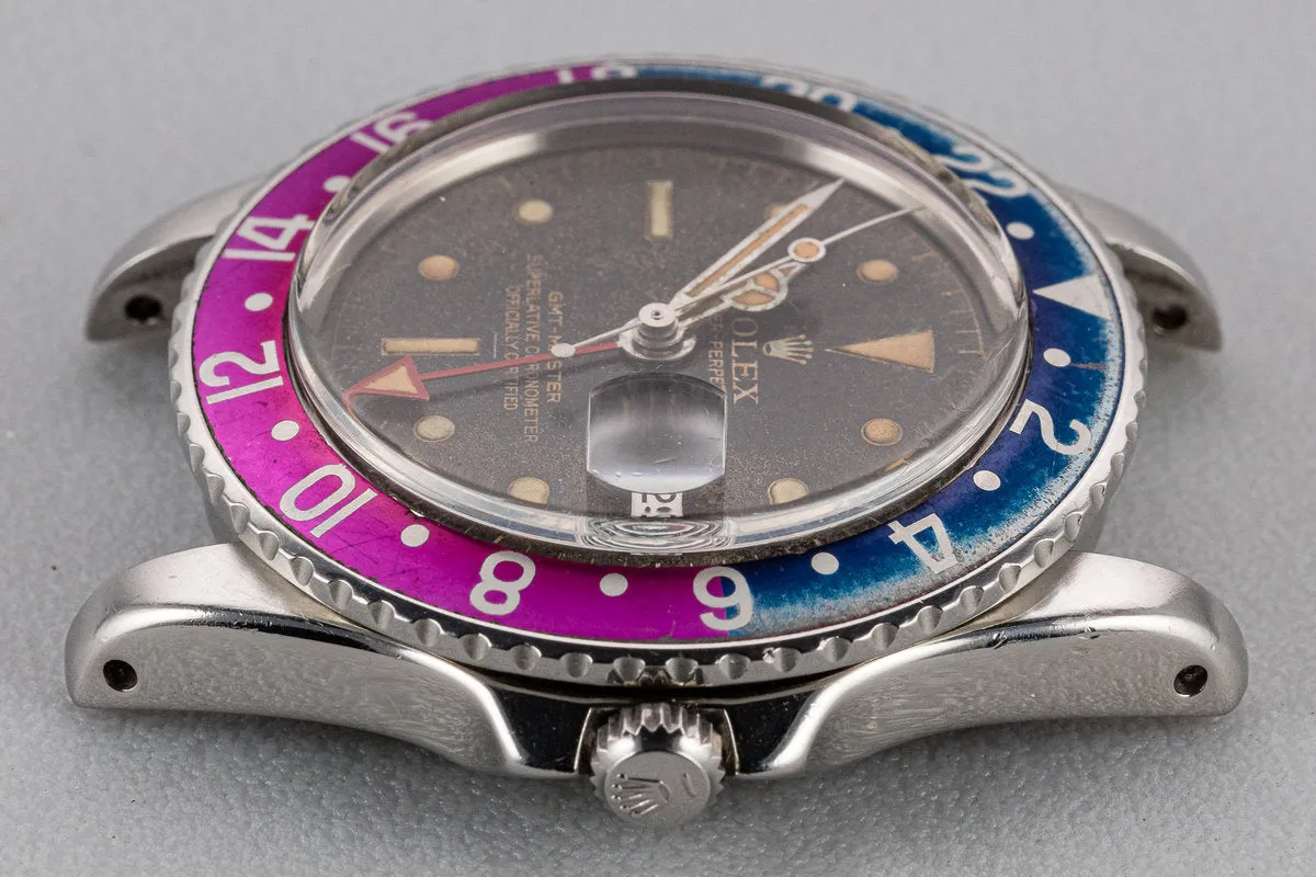 1963 Rolex PCG GMT-Master 1675 Fuchsia with Gilt Underline Dial and All Red 24 Hour Hand