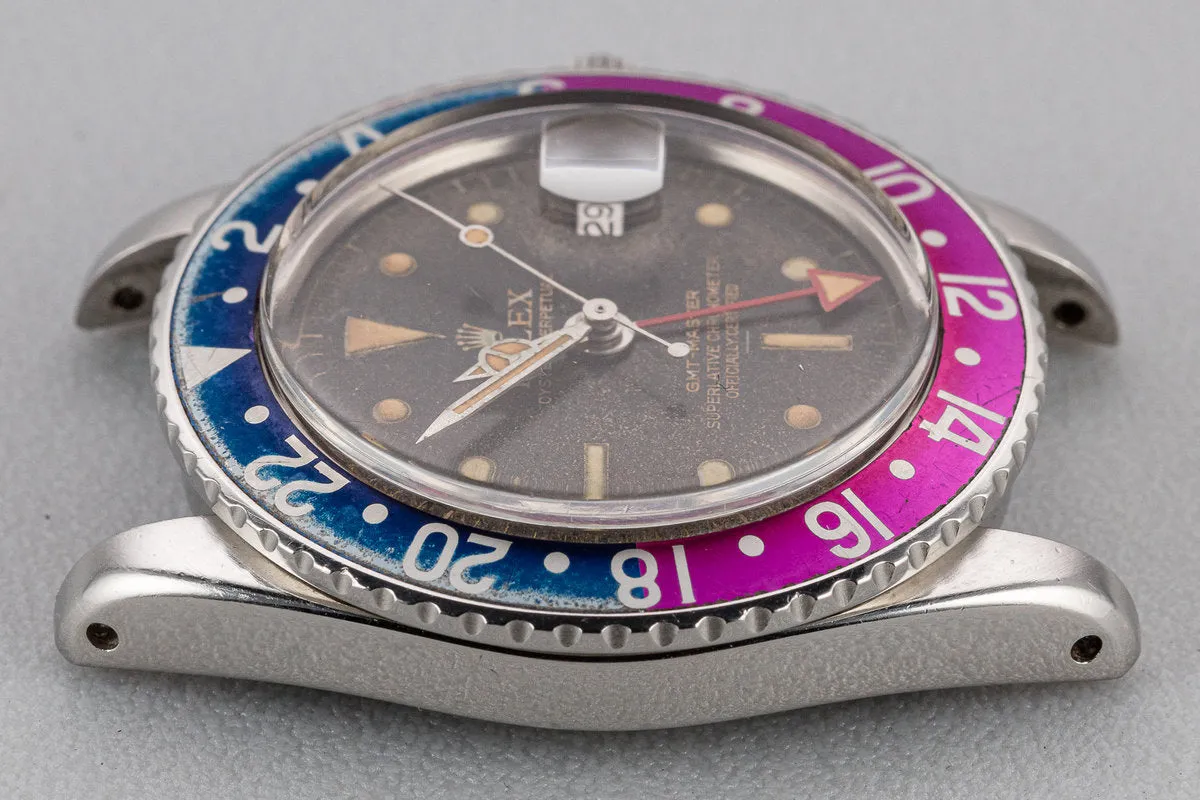 1963 Rolex PCG GMT-Master 1675 Fuchsia with Gilt Underline Dial and All Red 24 Hour Hand