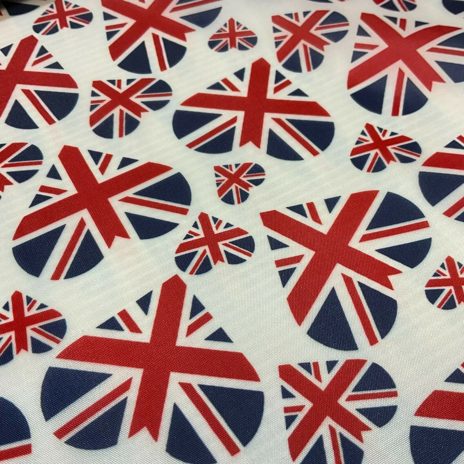 Jubilee Lightweight White union jack heart polyester Fabric 147cm M1607