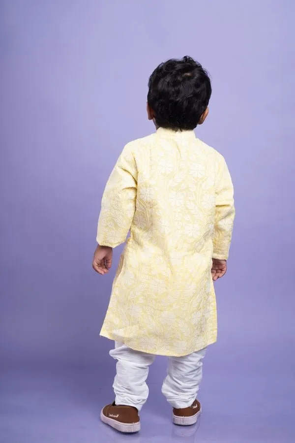 Traditional pink kurta with embroidered yellow jacket and white dhoti pants for a festive and vibrant look