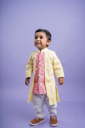 Traditional pink kurta with embroidered yellow jacket and white dhoti pants for a festive and vibrant look