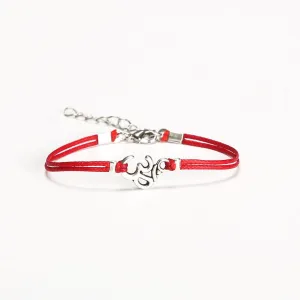 Women bracelet with a silver tone Om charm, red cord, yoga jewelry